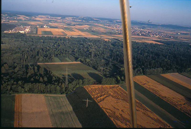 Balloon flight over fields.