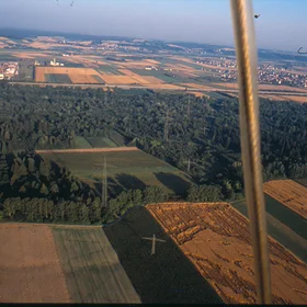 Balloon flight over fields.
