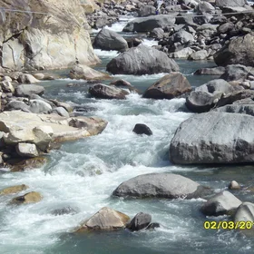 A Natural Phenomenon: Hot water Spring entering in cold water