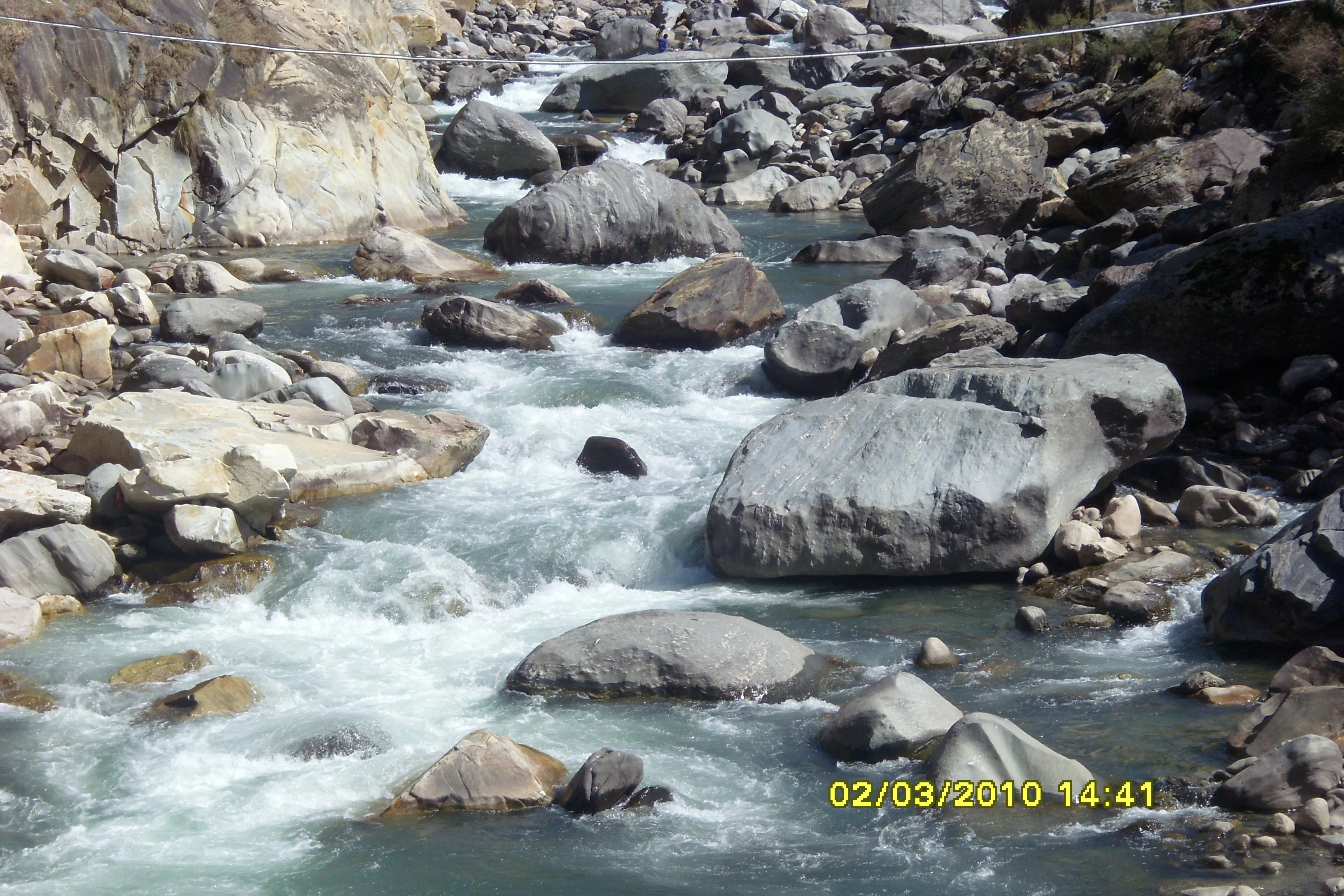 A Natural Phenomenon: Hot water Spring entering in cold water