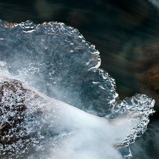 Ice and flowing water by Daniele Penna