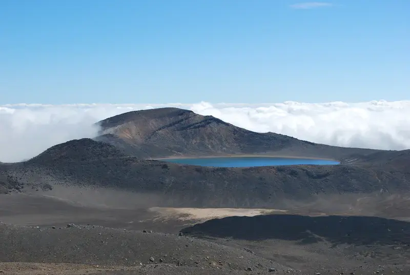 Volcanic lake in clouds