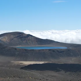 Volcanic lake in clouds