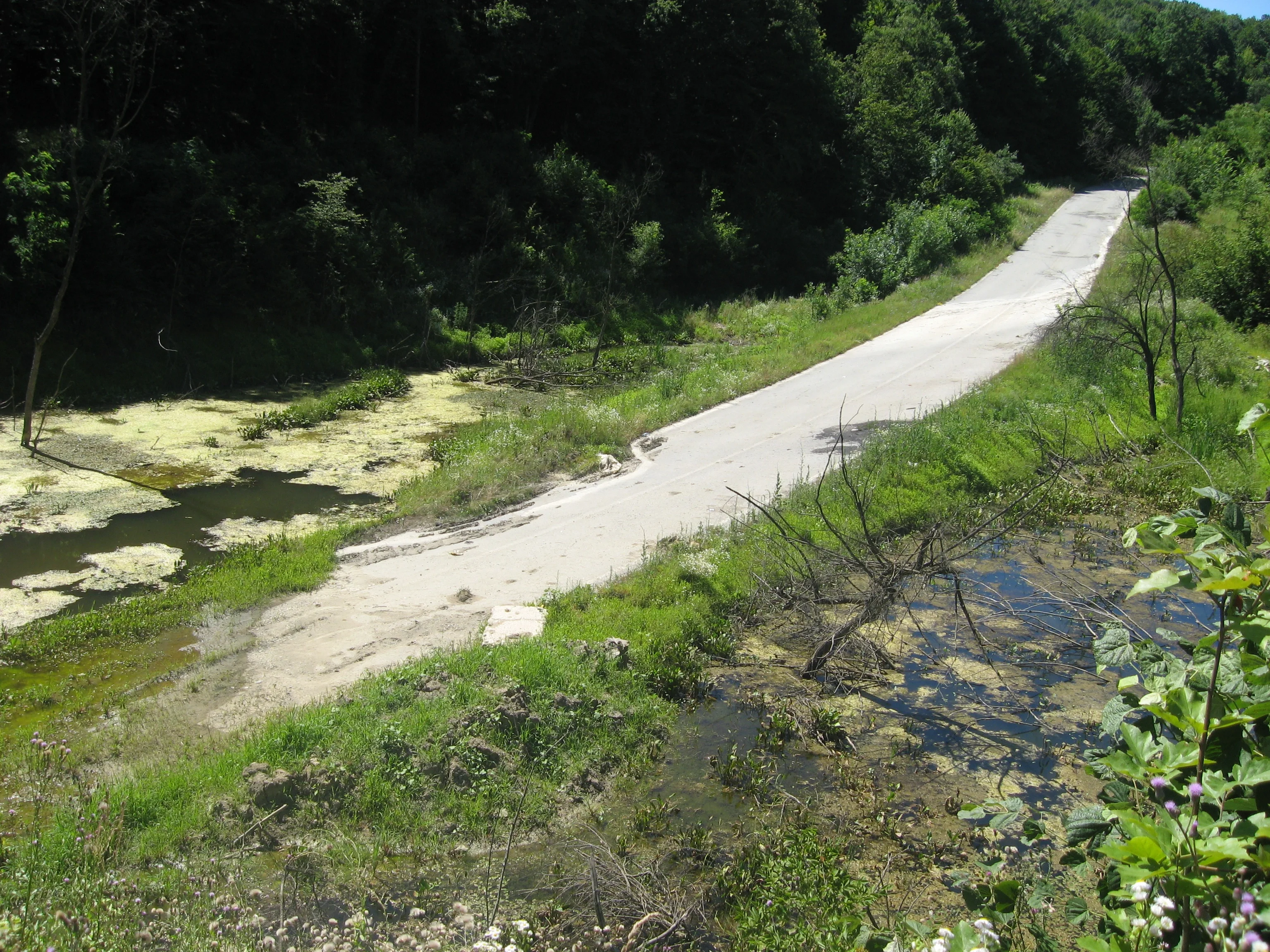 National road on waste dump