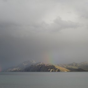 Double rainbow over a Tibetan Plateau lake