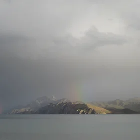 Double rainbow over a Tibetan Plateau lake