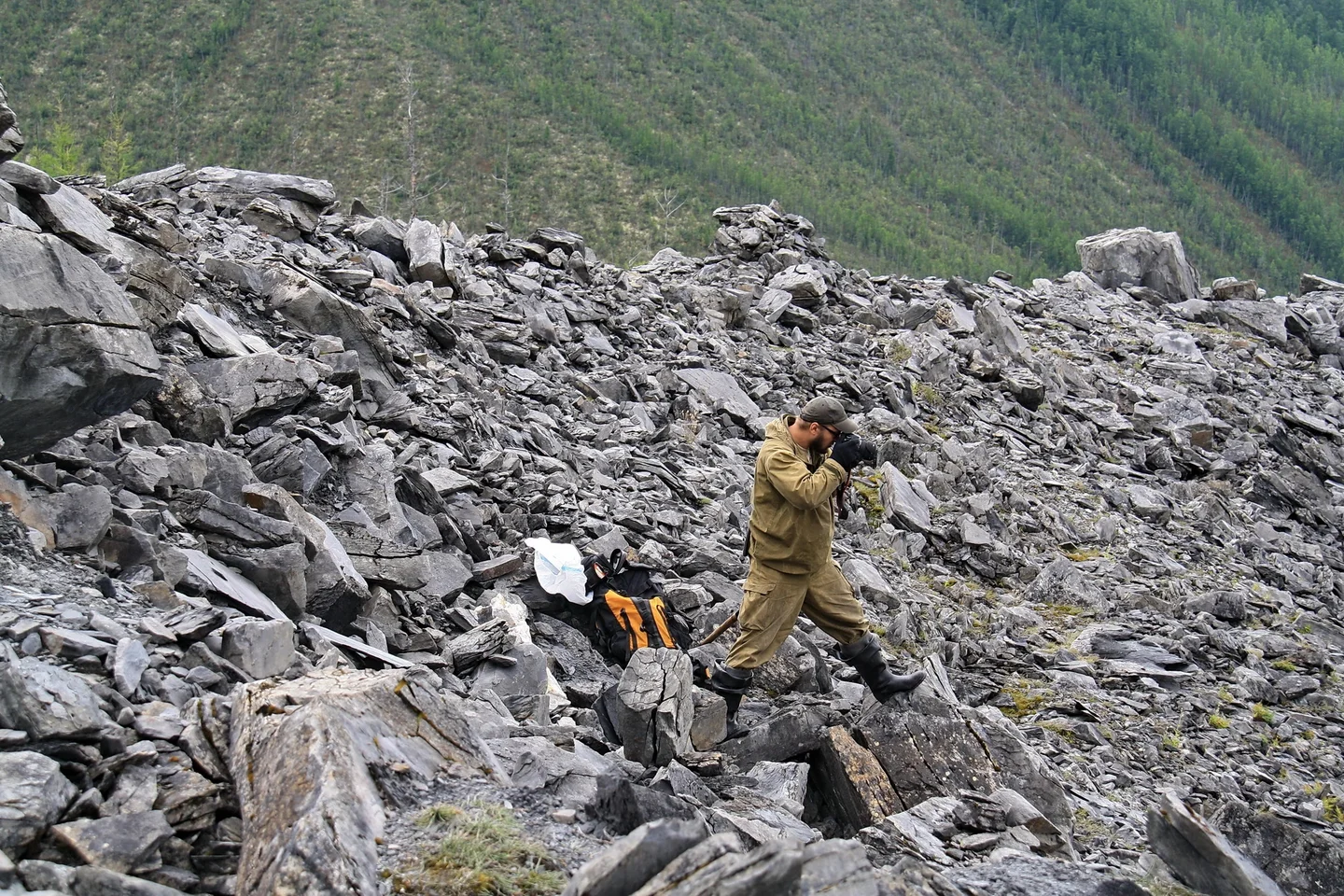 Inside Patomsky crater: geologist at work