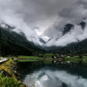 Cloudy fjord at dawn