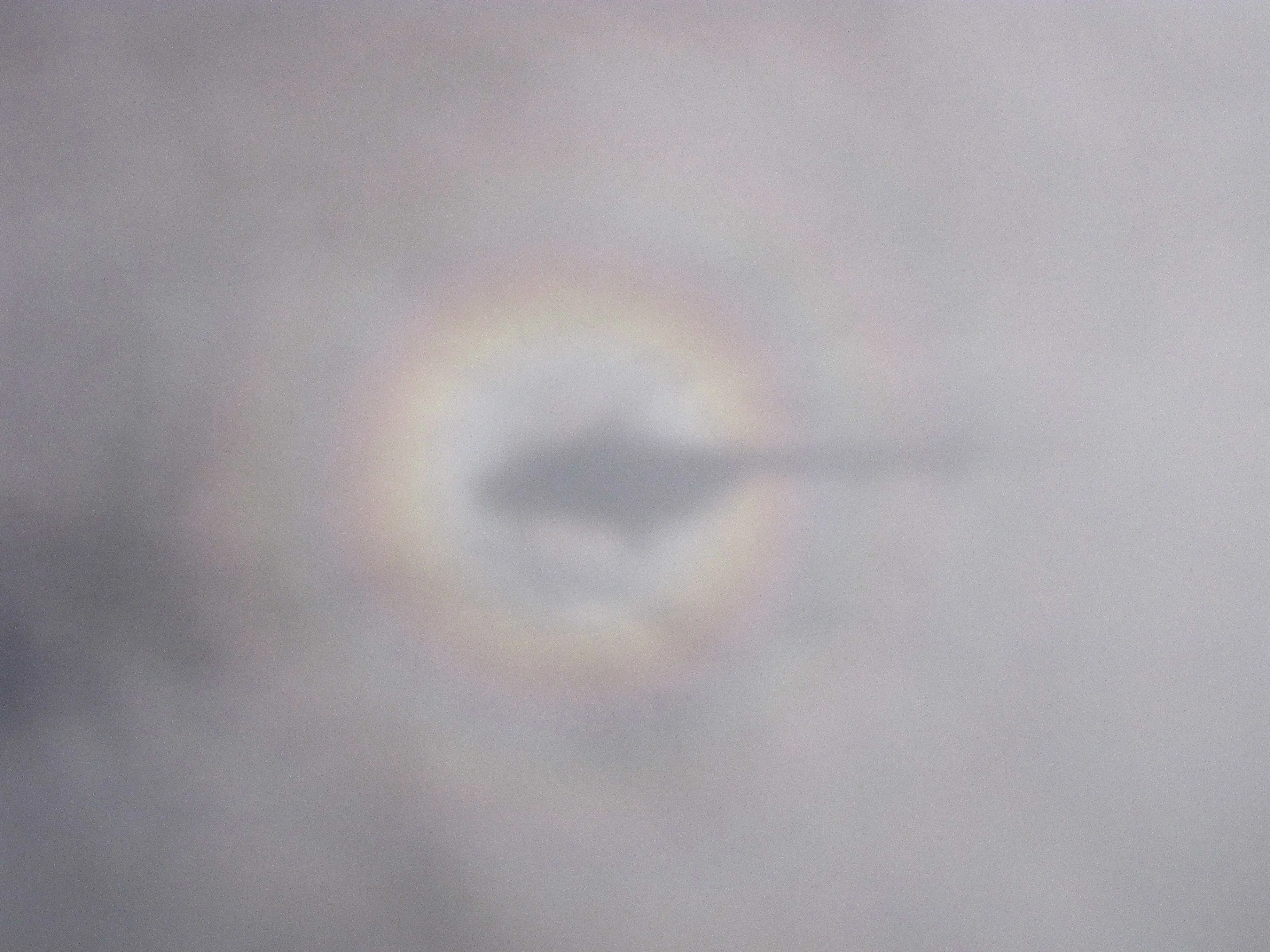 Helicopter over the clouds