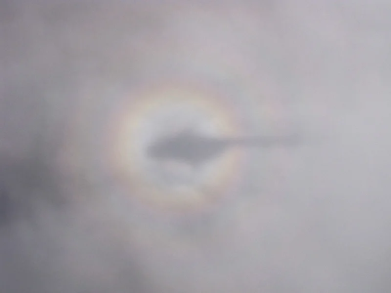 Helicopter over the clouds