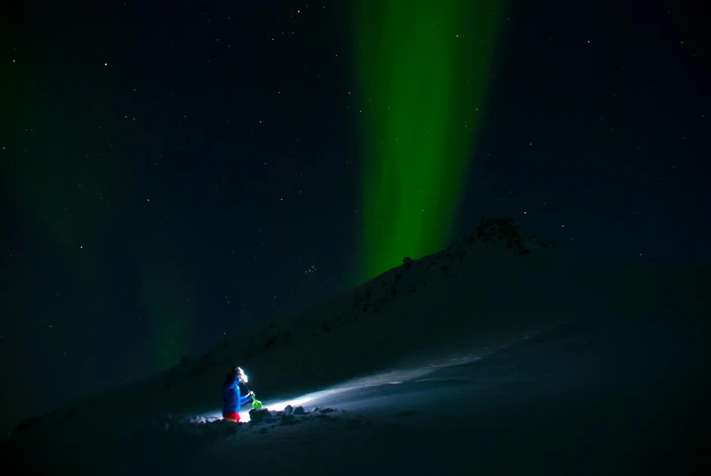 Snow stability testing under Northern Lights