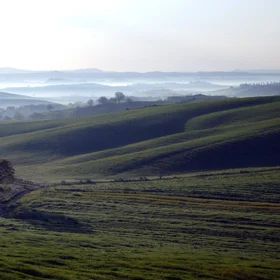 Late-winter sunrise on a hilly landscape in Tuscany (Central Italy)