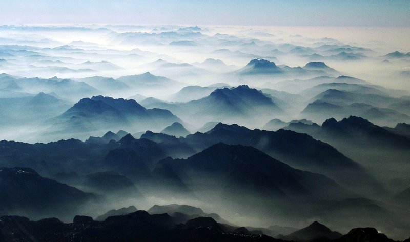 Alpine massifs above low level haze