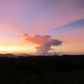 Clouds saluting the sun