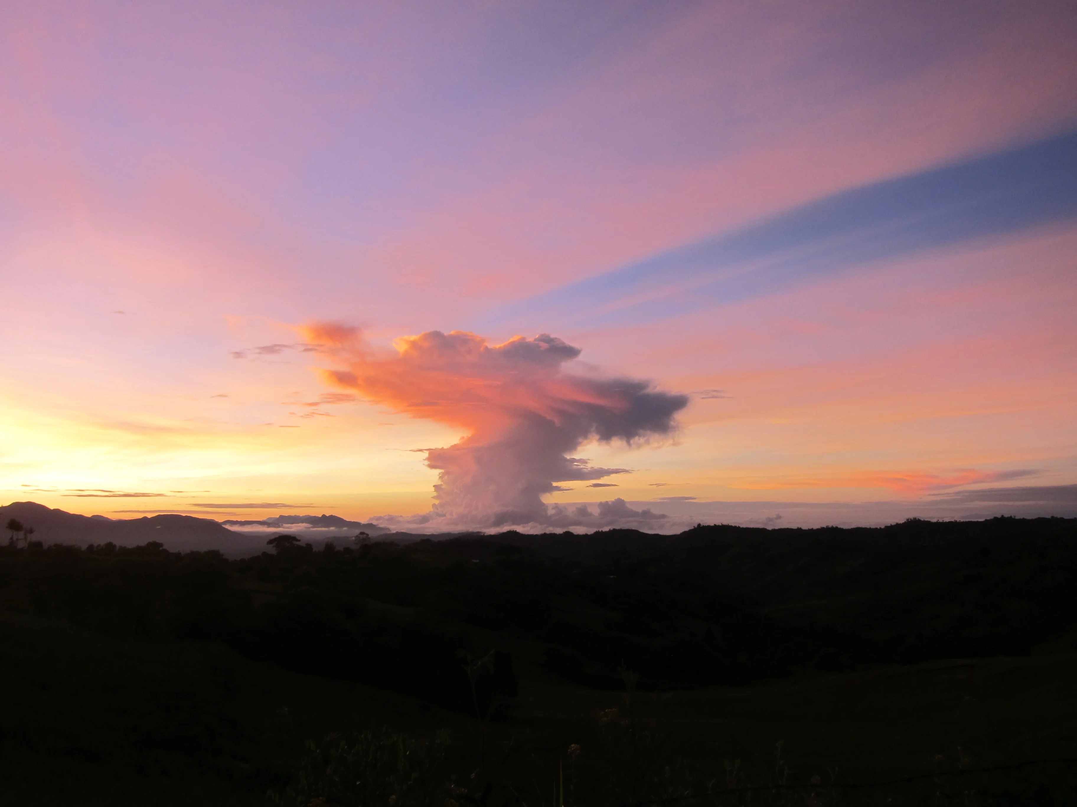 Clouds saluting the sun