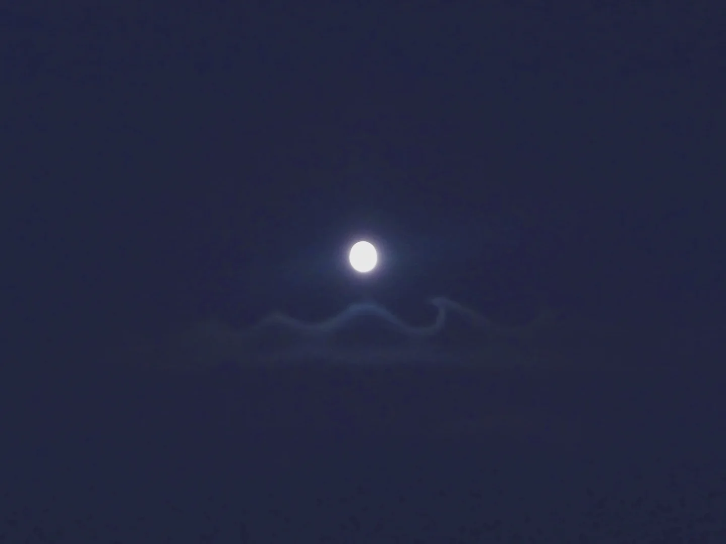 Wavy clouds at night