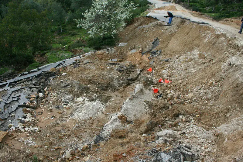 Land slide due to heavy rainfall caused damages to a rural road