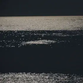 Sea lit by full moon