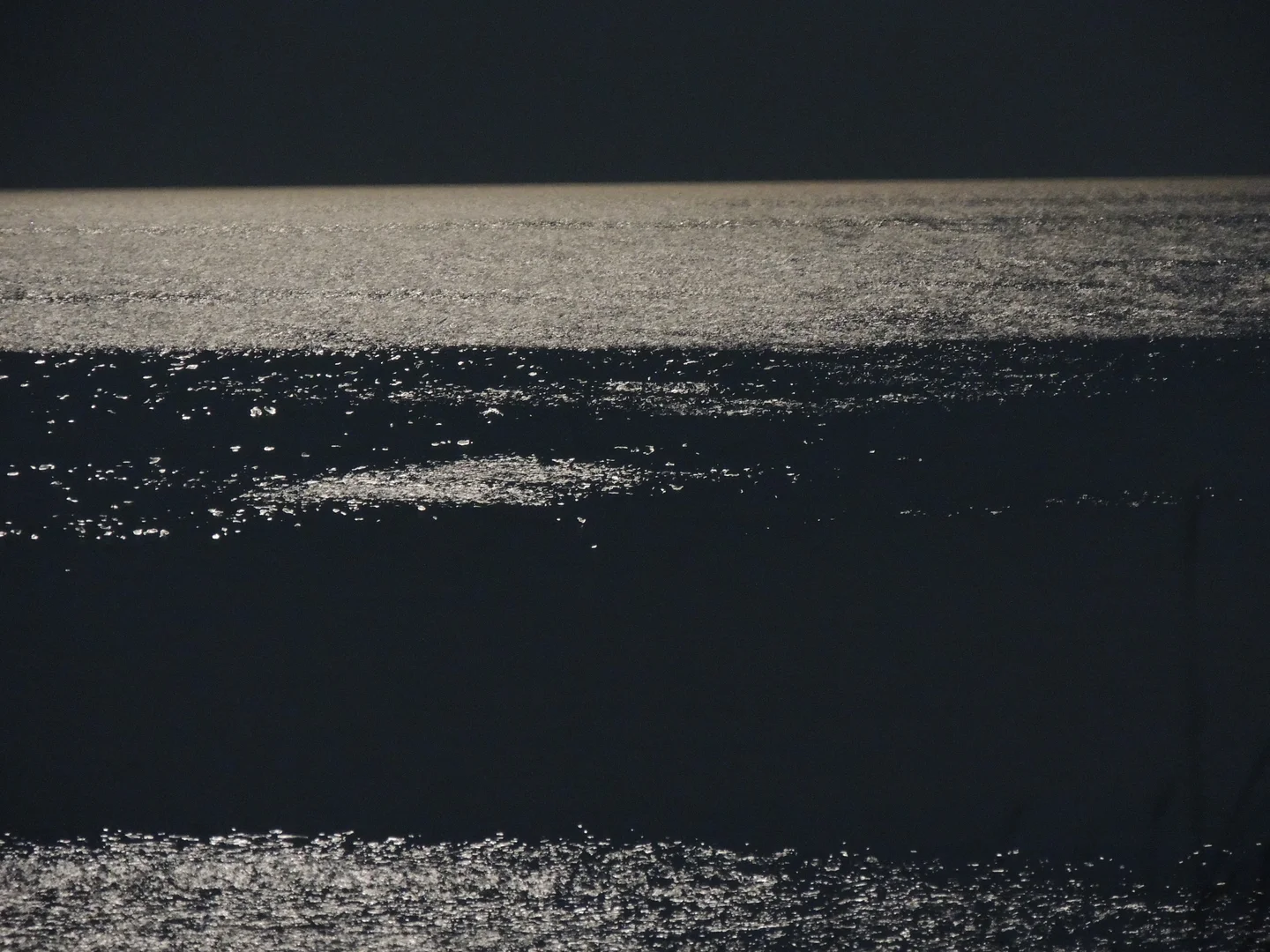 Sea lit by full moon