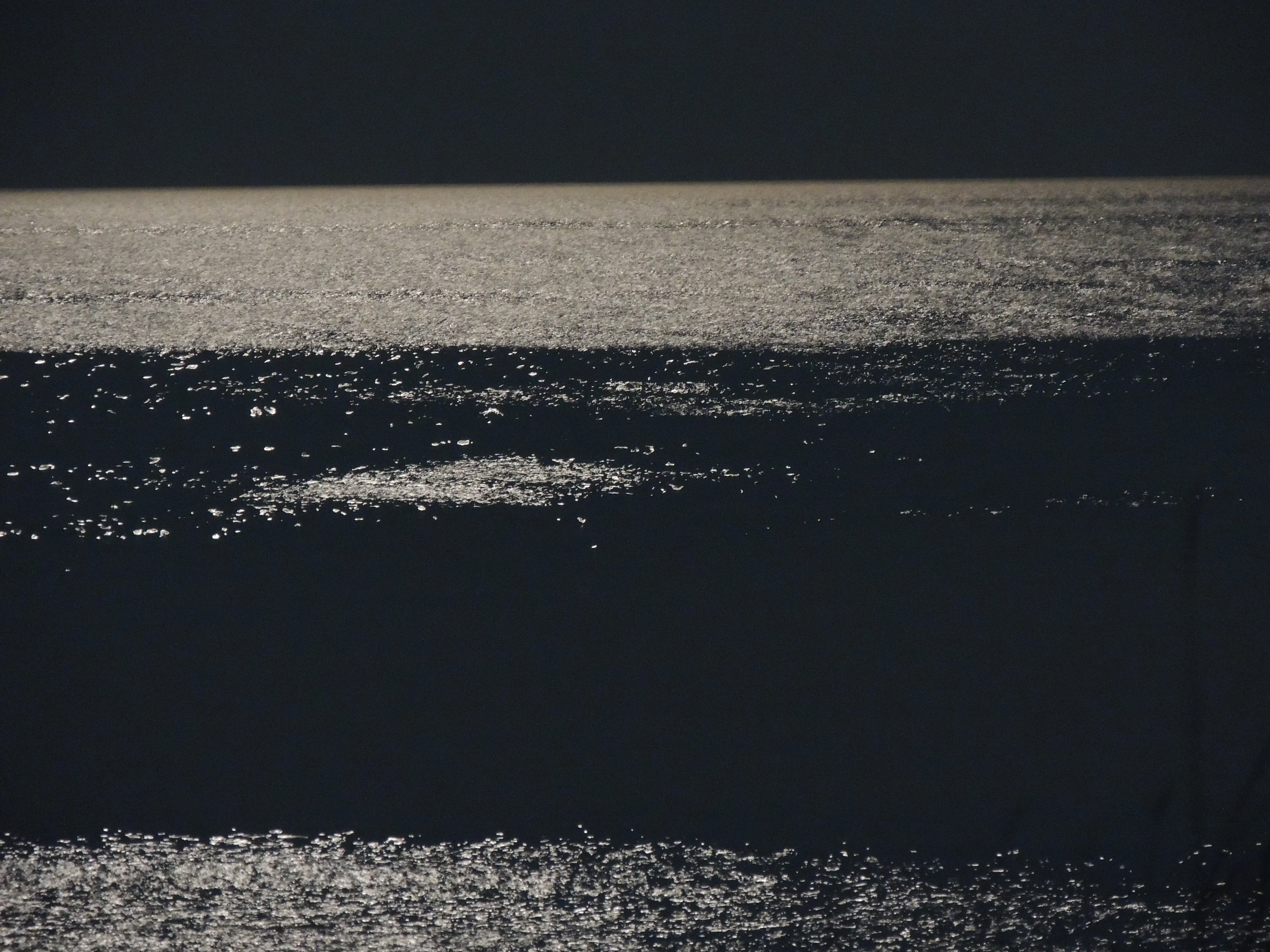 Sea lit by full moon