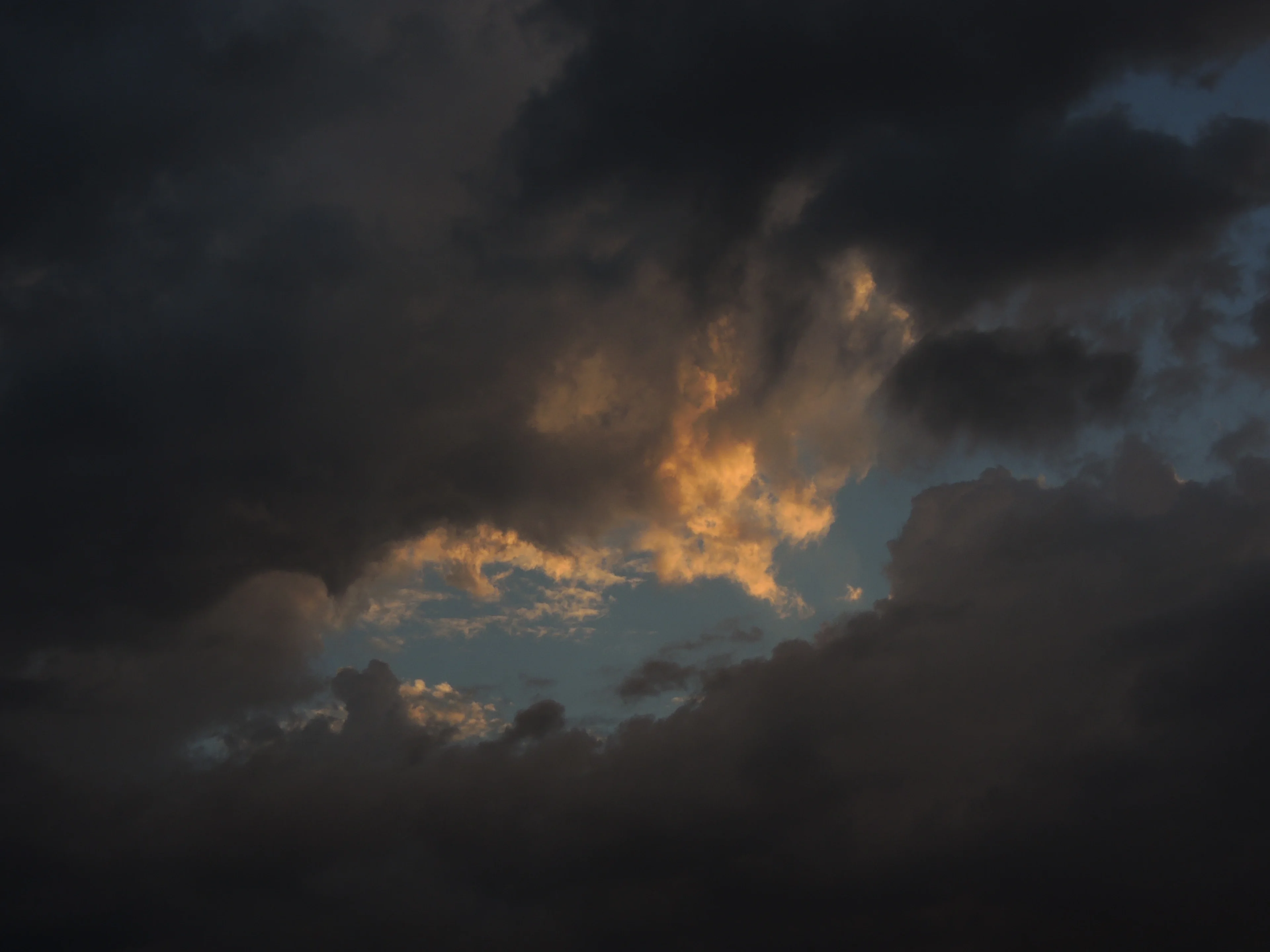 Storm clouds one hour before sunset