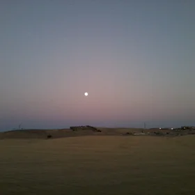 Sun or Moon? It is a Full moon rising on Bouira city