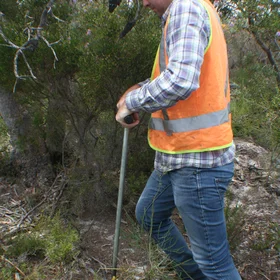 Soil scientists in action: Jason is sampling sandy soil