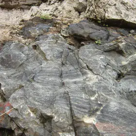 Minor recumbent folds in charnockite (metamorphic) rock in Sri Lanka