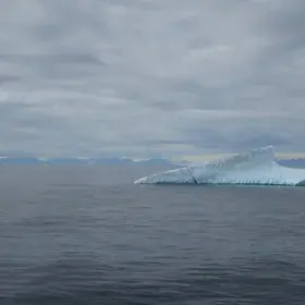 Iceberg in front of the biggest fjord in the World
