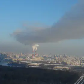 Gray plume of smoke over the big city