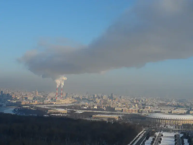 Gray plume of smoke over the big city