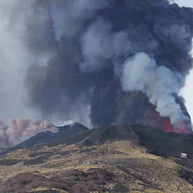 Colorful rainbow on the sky above Etna