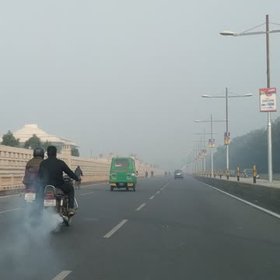 Air Pollution from an old bike in Lucknow, India