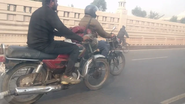 Air Pollution from an old bike in Lucknow, India