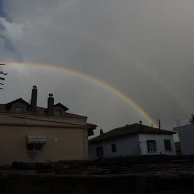 Double rainbow with Alexander's band in-between