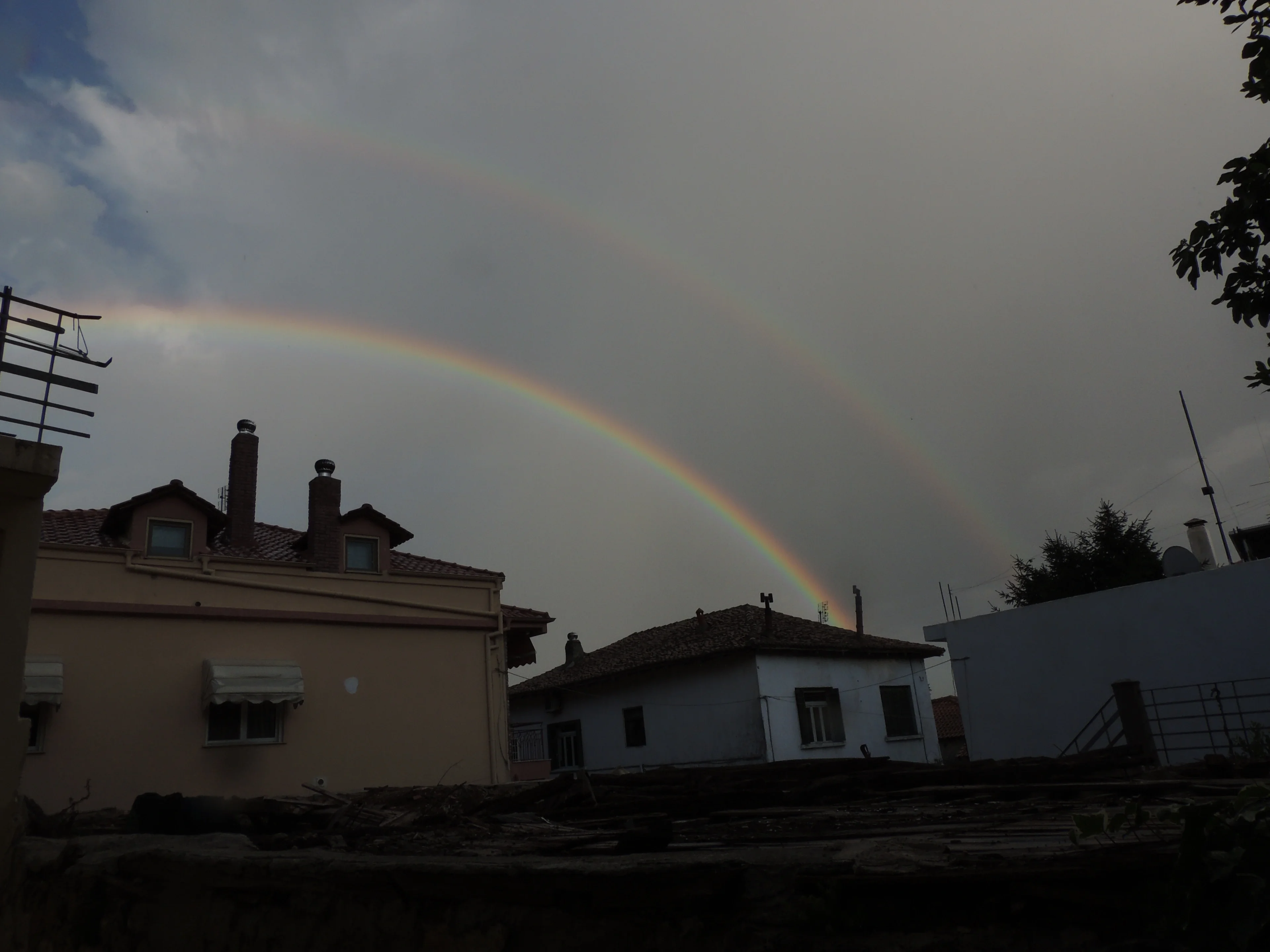 Double rainbow with Alexander's band in-between