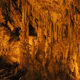 Stalagmites and stalagtites in Perama cave