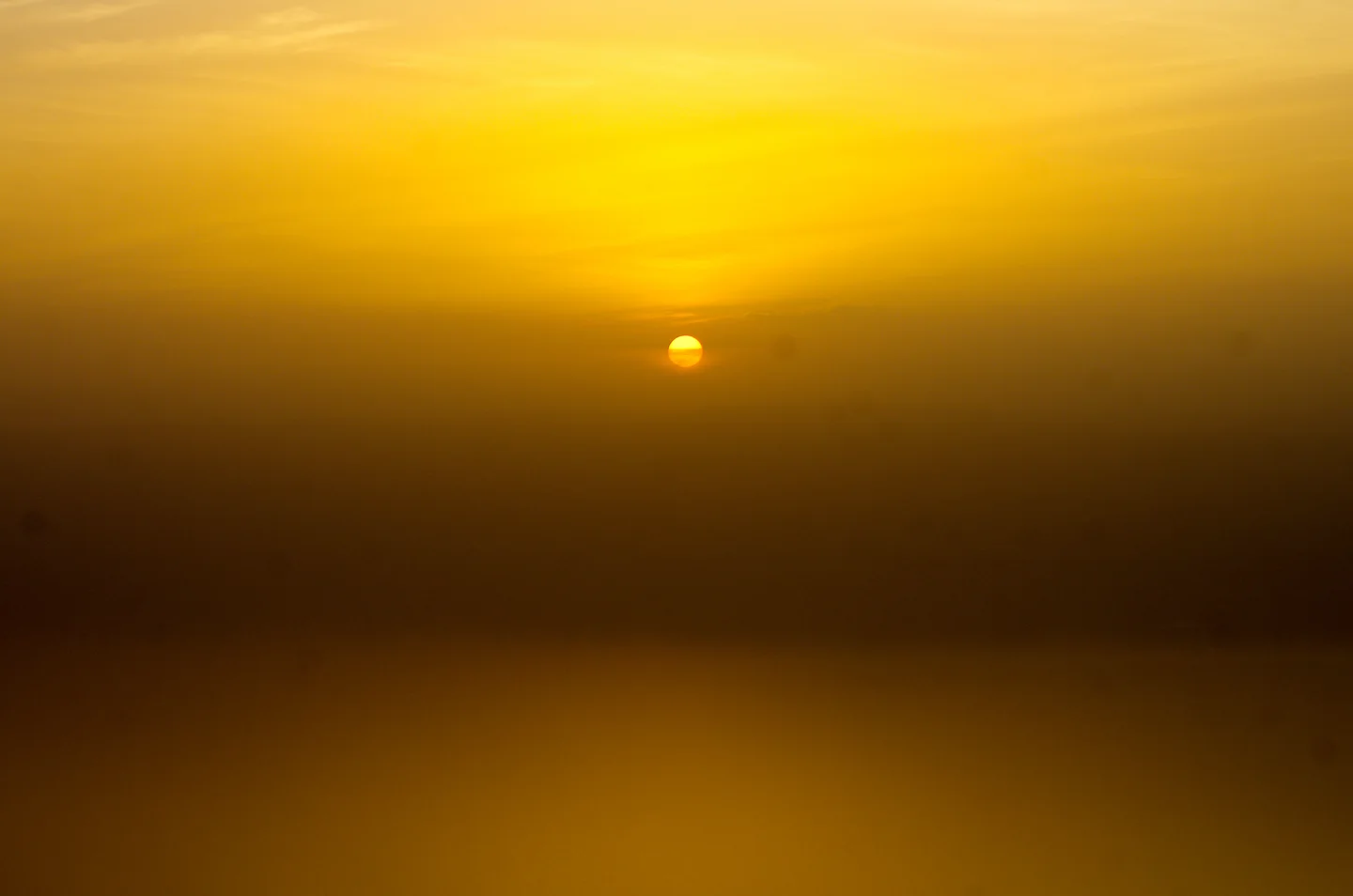 Sunset above the hazy Dead Sea