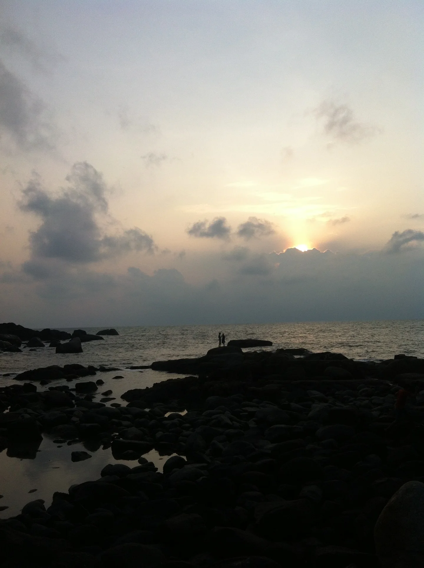 sweet couple enjoy the sunset in Goa