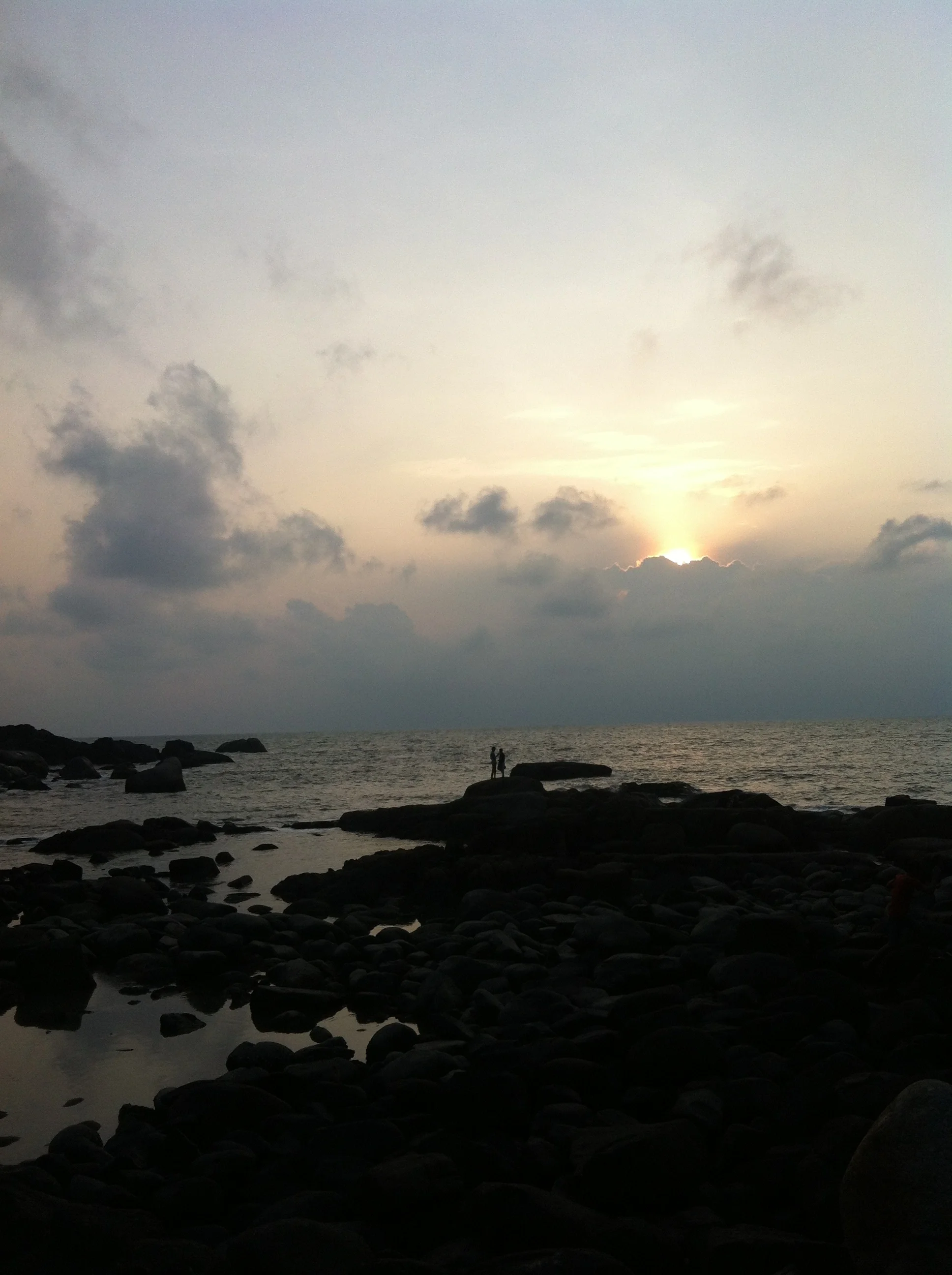 sweet couple enjoy the sunset in Goa