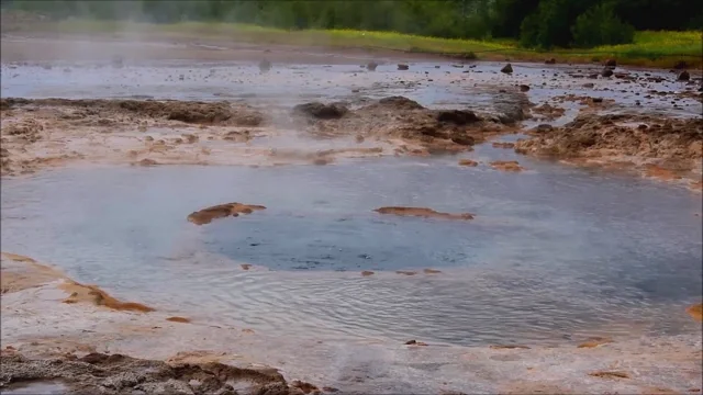 Strokkur geysir prepares its eruption