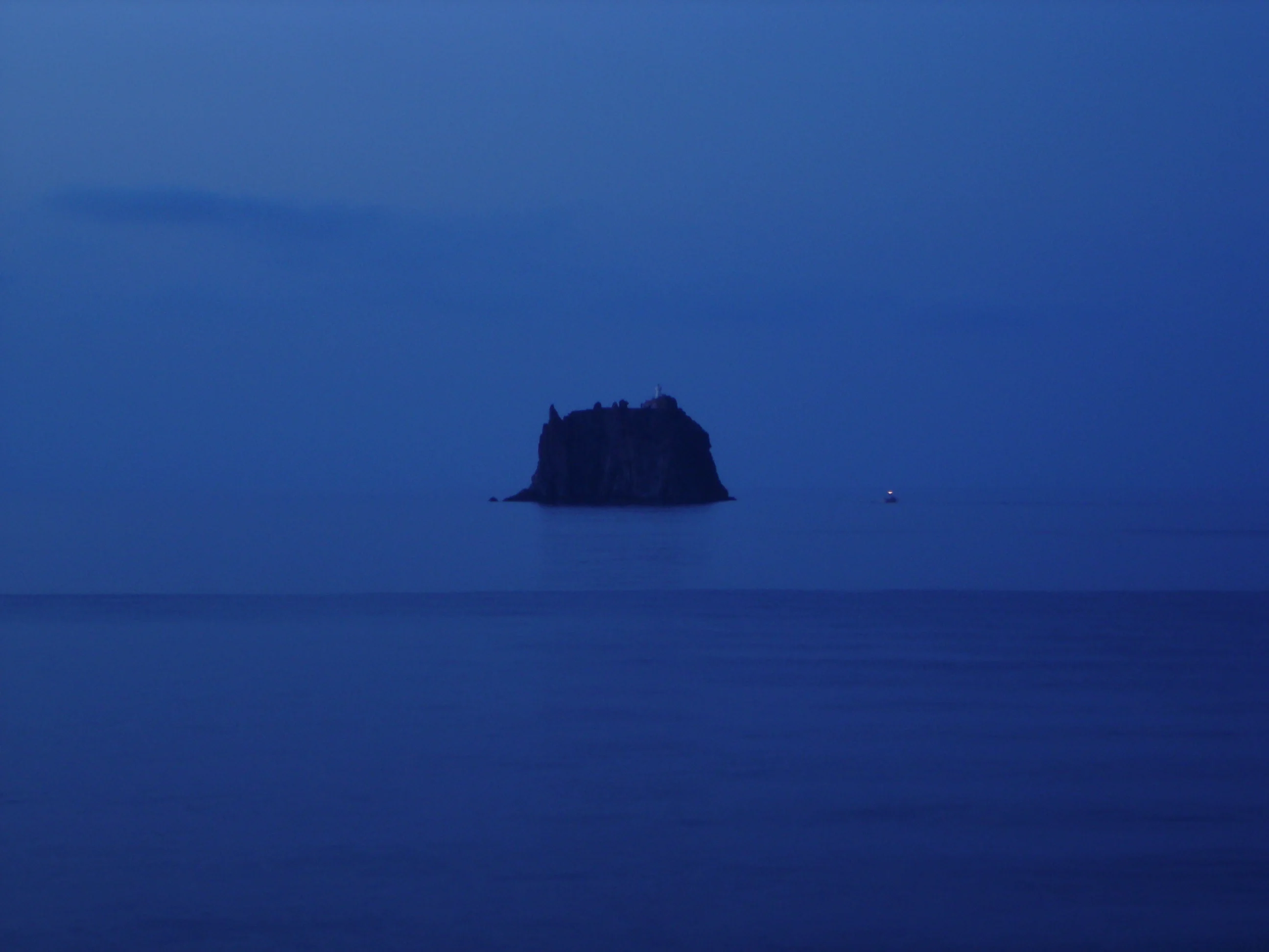 Strombolicchio volcanic neck out of the blue