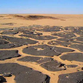 Buried columns covered by sand
