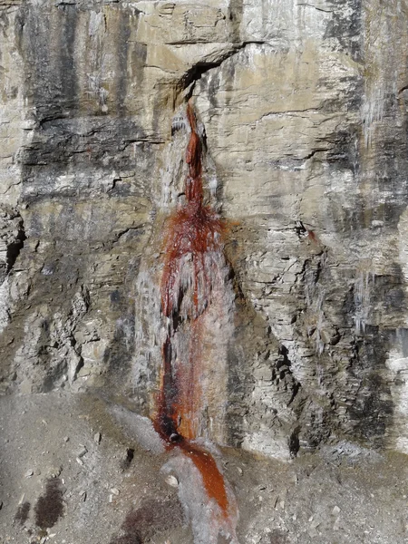 Rock wall is bleeding