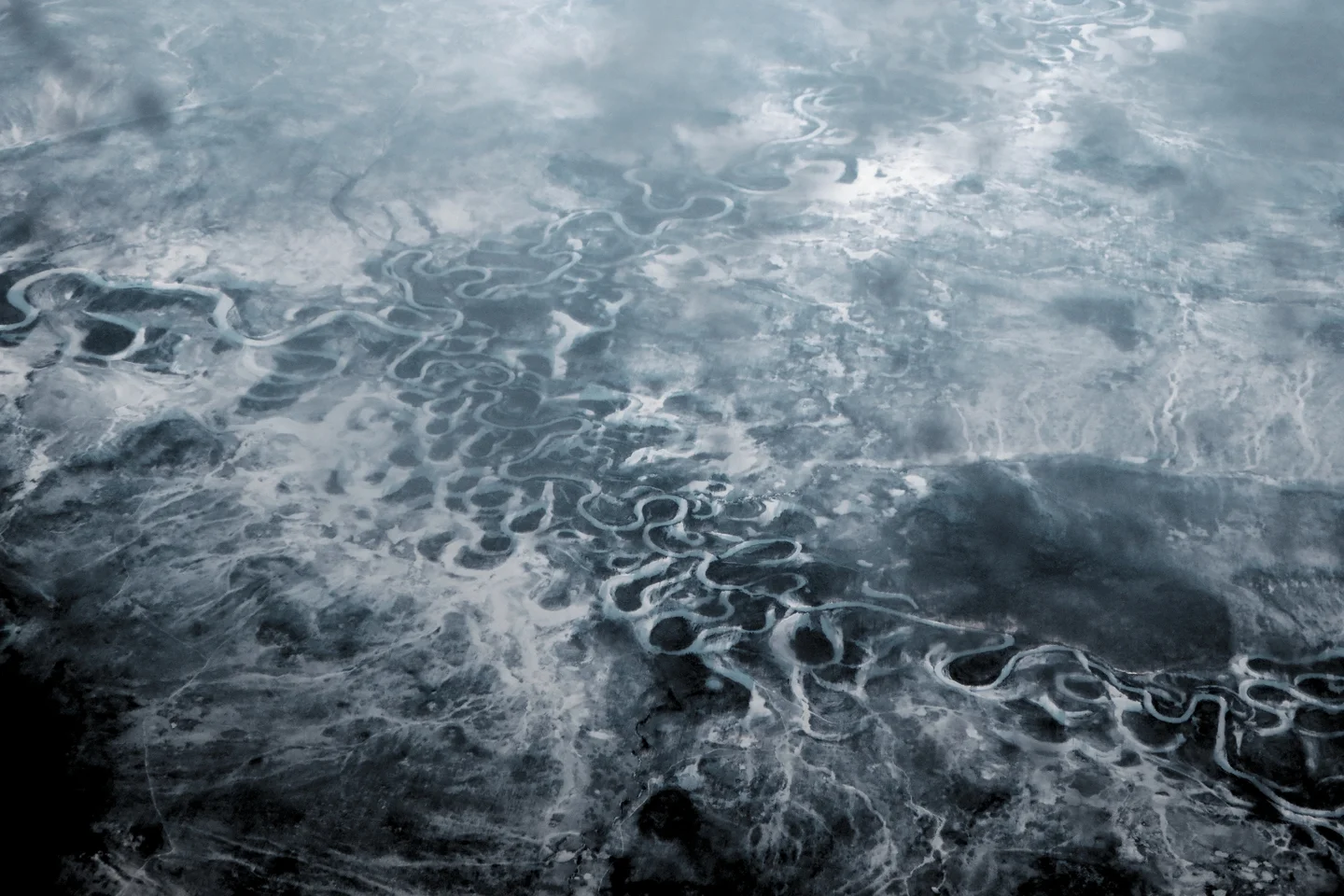 Natural river course in early winter Siberia