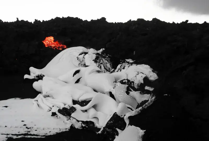 Snow folded by advancing lava
