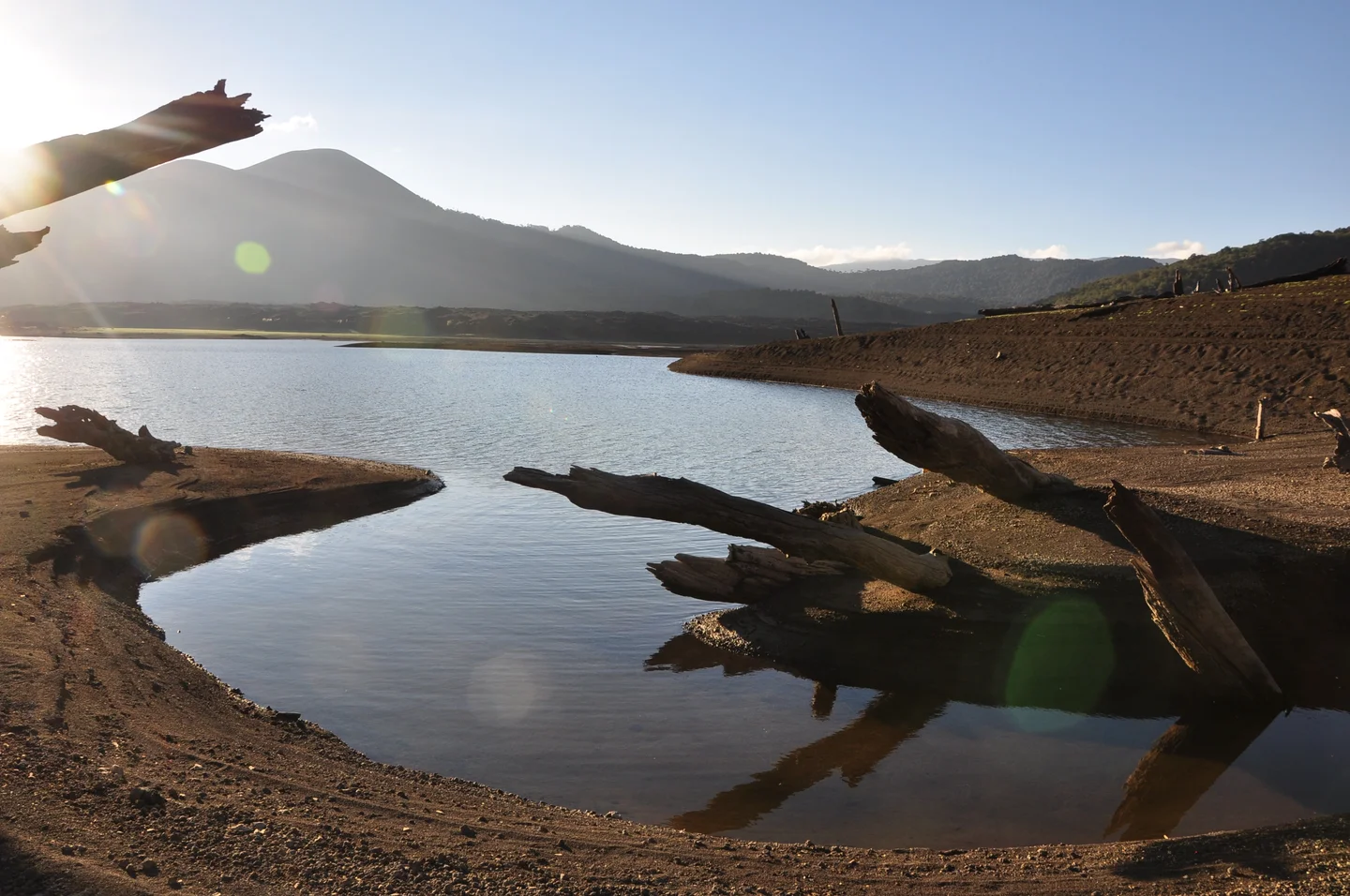 Sunset, LLaima volcano and eruptions' relicts