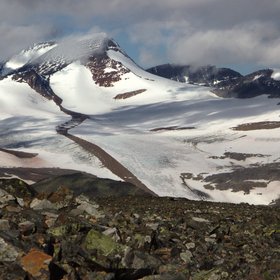 Oarjep Oalgasjjiegne glacier in Sarek sorounded by the Alkatj mountains