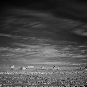 Cirrus over tent-city