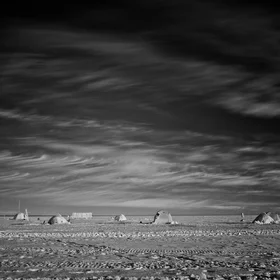 Cirrus over tent-city
